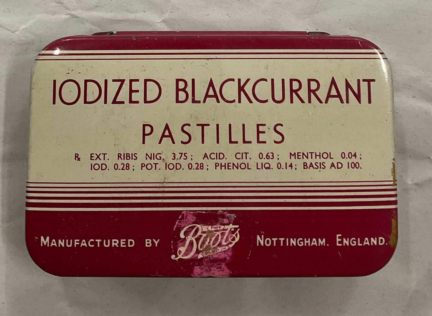 Vintage Boots Iodized Blackcurrant Pastilles tin, manufactured in Nottingham, England.