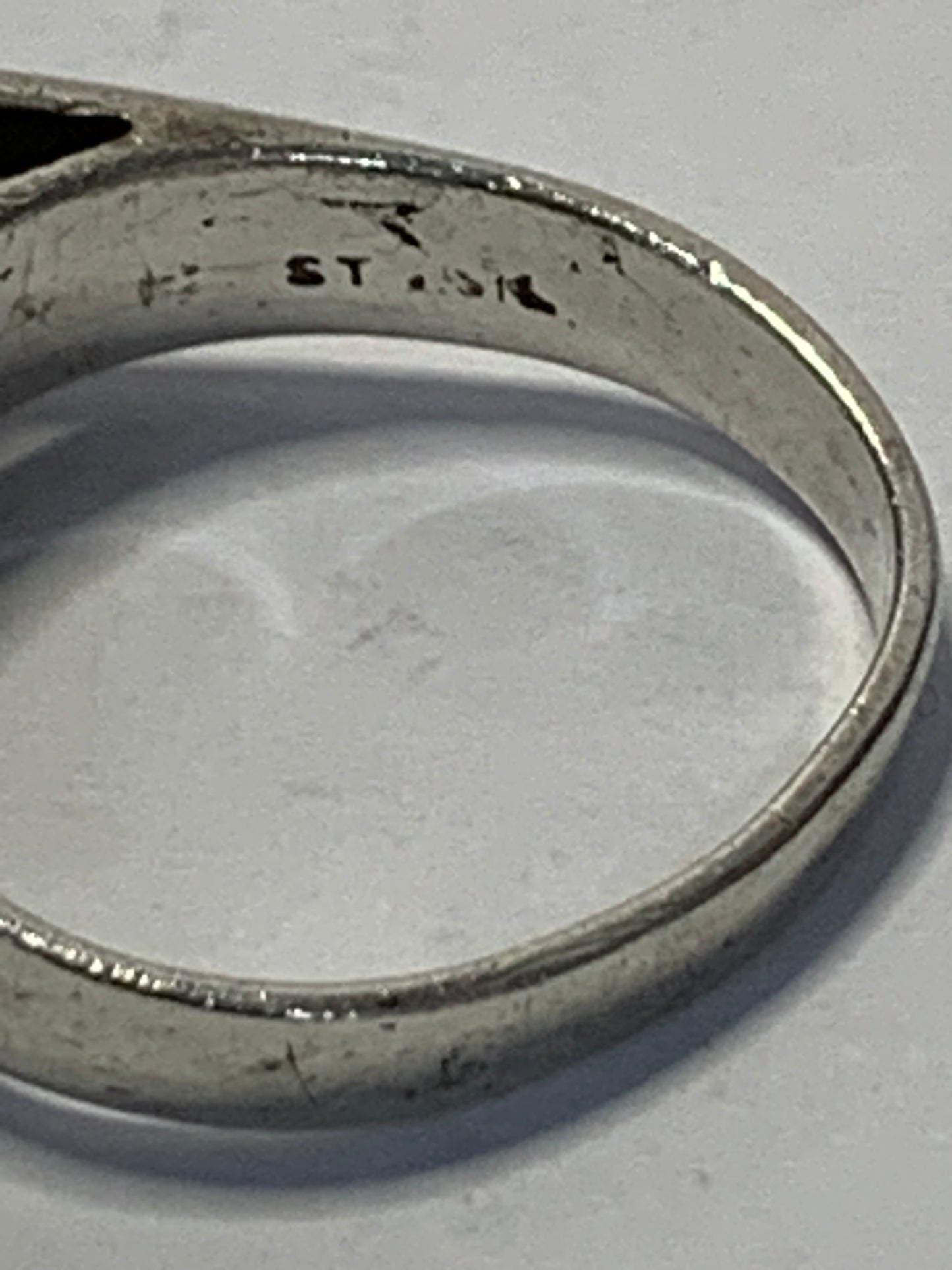 Vintage Sterling Silver Ring featuring an oval cabochon green stone (likely jade or aventurine) in a six-prong setting