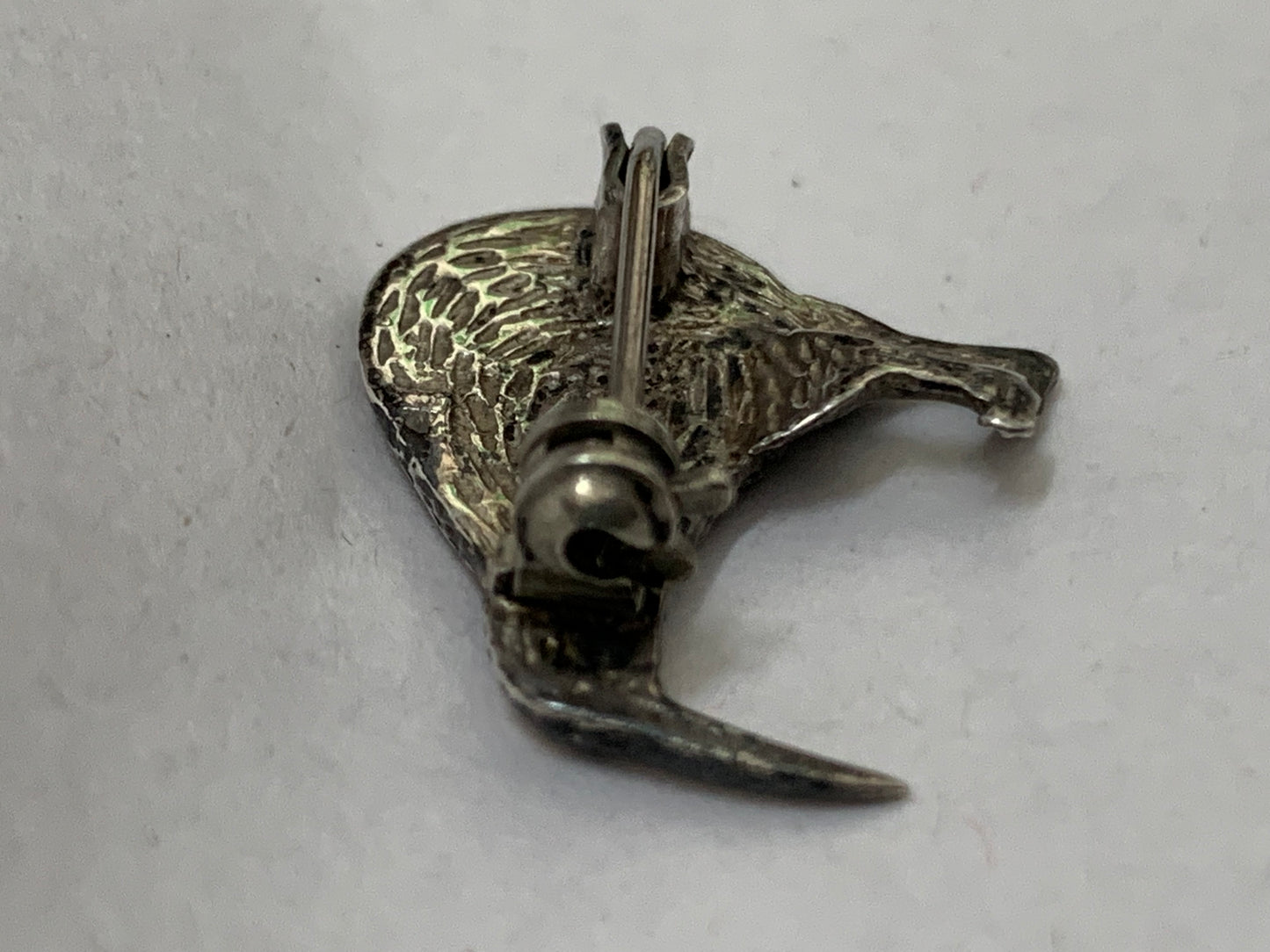 Vintage silver kiwi bird brooch with paua shell (abalone) inlay, likely from New Zealand, dating from approximately the 1960s-1980s.