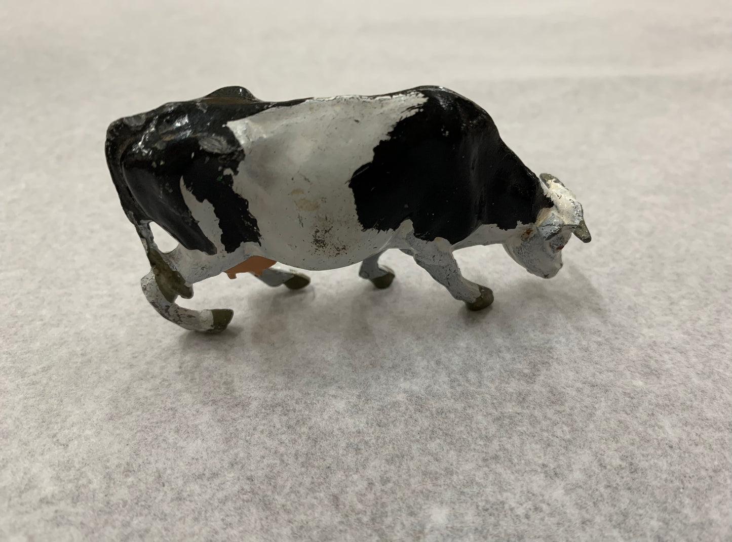 Vintage lead Freesian cow miniature figurine made in England