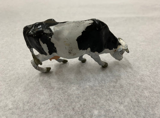 Vintage lead Freesian cow miniature figurine made in England
