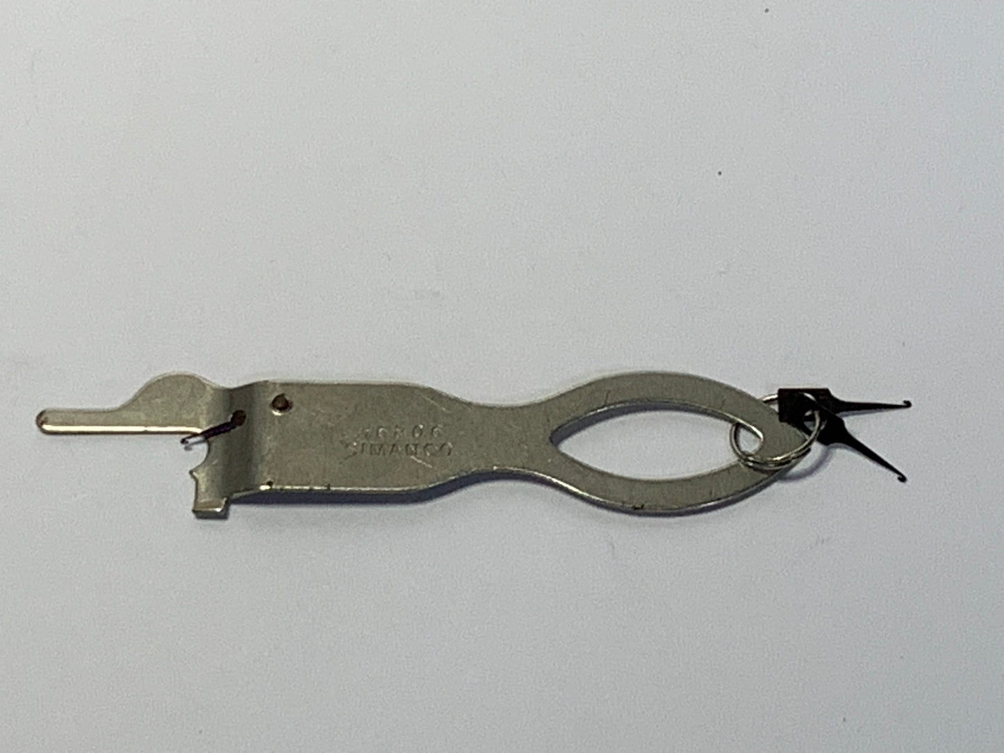 Vintage Singer Needle Threader No. 36806 with original packaging and documentation