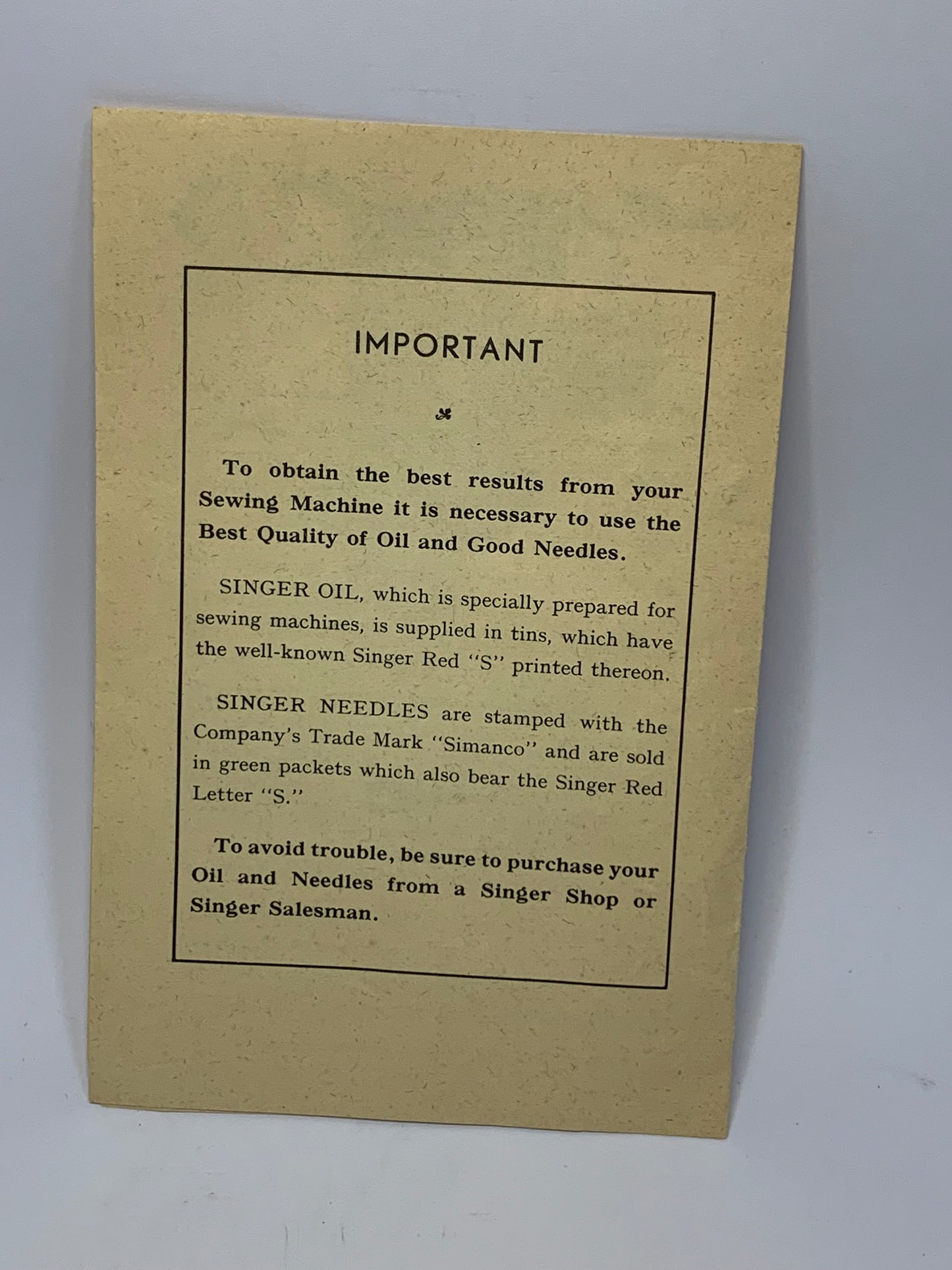 Vintage Singer Needle Threader No. 36806 with original packaging and documentation