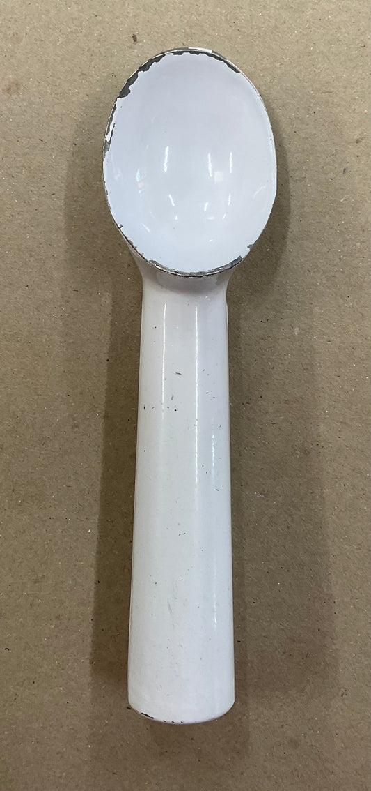 Vintage white enamel ice cream scoop with a tubular handle