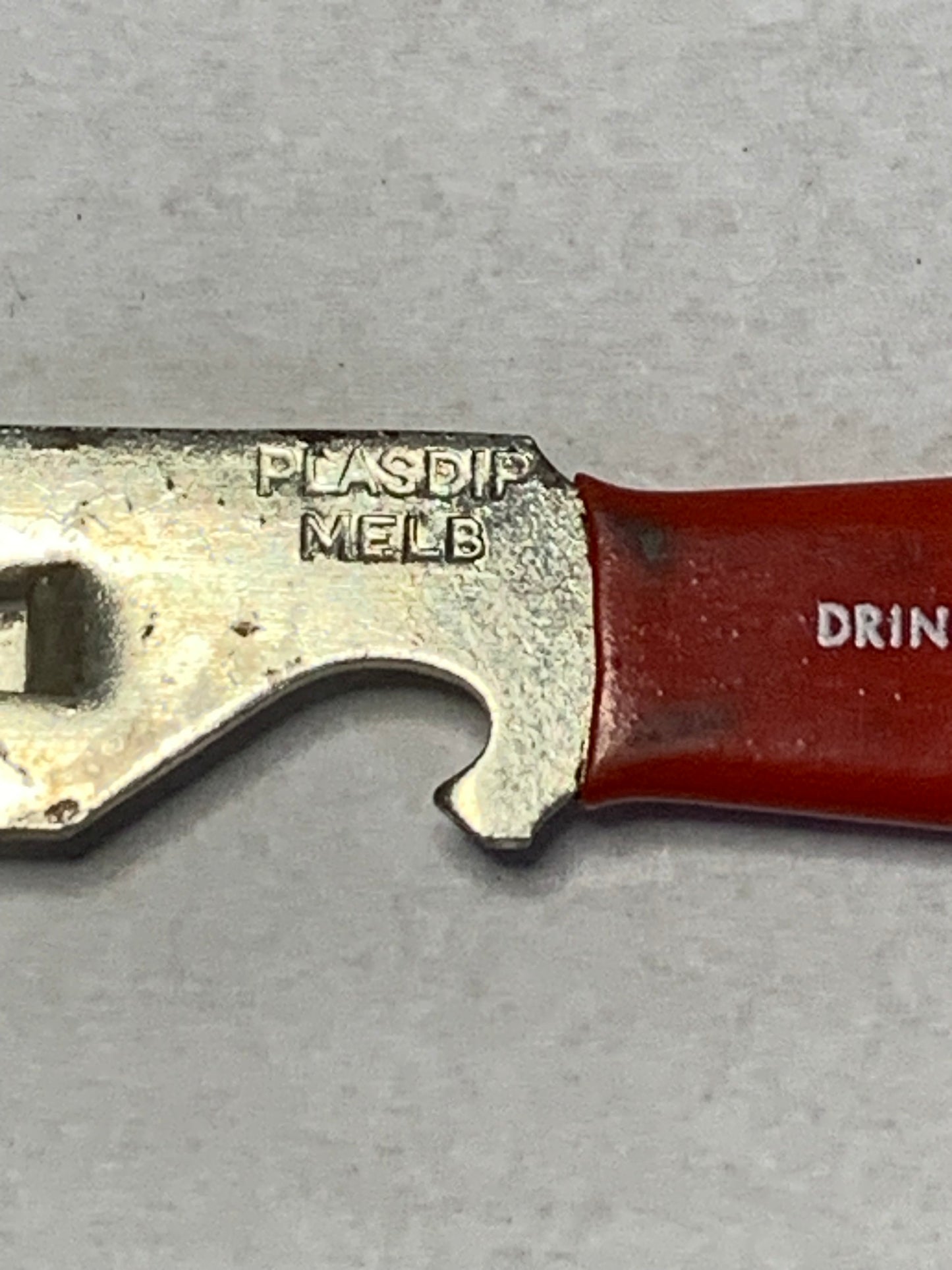 Vintage “Drink Raleigh Tomato Juice” advertising bottle/can opener