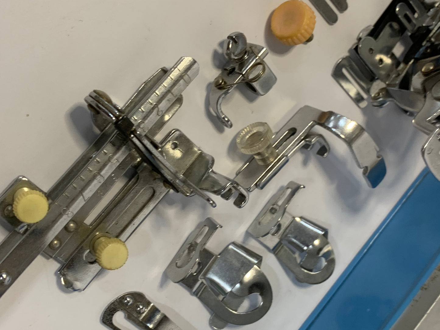 Vintage Sewing Machine Attachments Tin with attachments