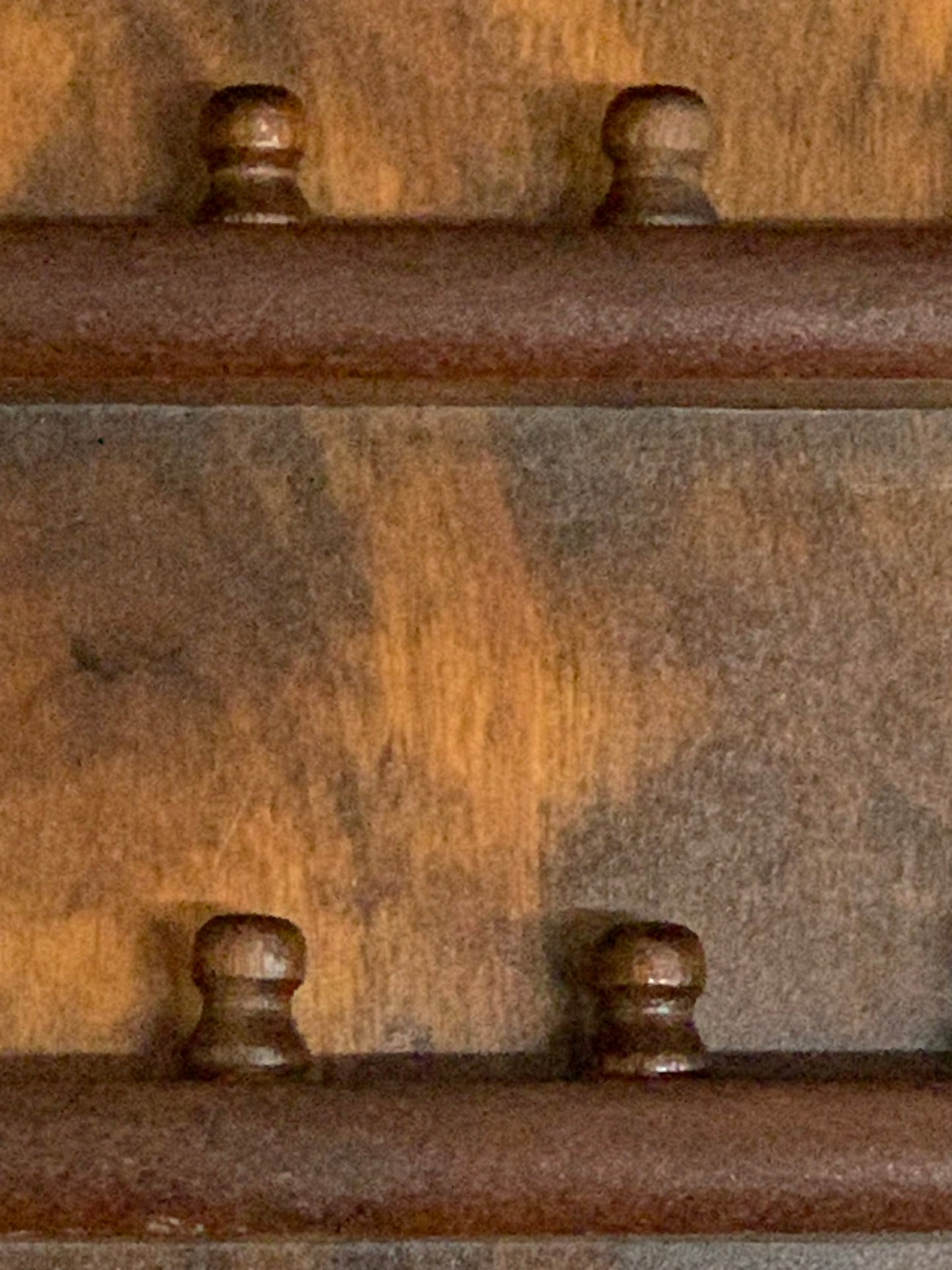 Vintage wooden wall-mounted thimble display rack, 1970s style, with a scalloped/shaped silhouette and rich mahogany-toned finish