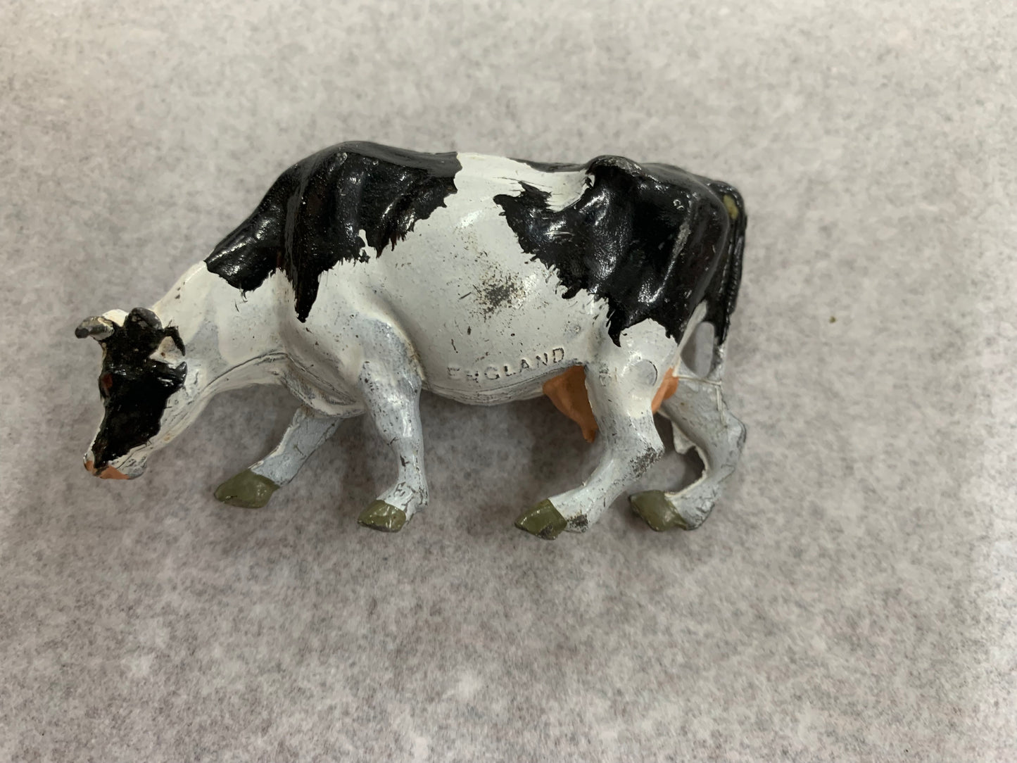 Vintage lead Freesian cow miniature figurine made in England