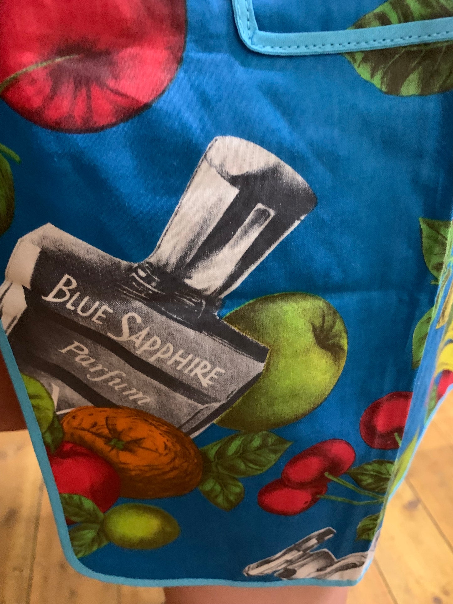 Vintage 1970s Taniwha Half Apron - Tropical Fruit & Perfume Bottle Novelty Print