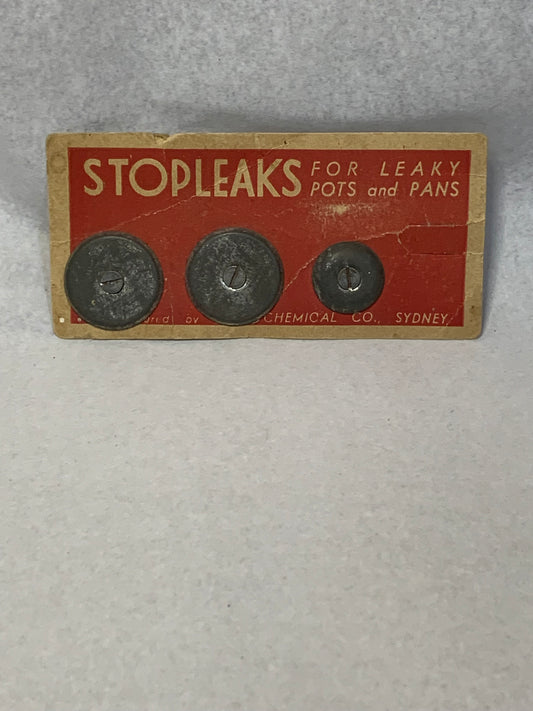 Vintage “Stopleaks” pot and pan mending kit on original store display card