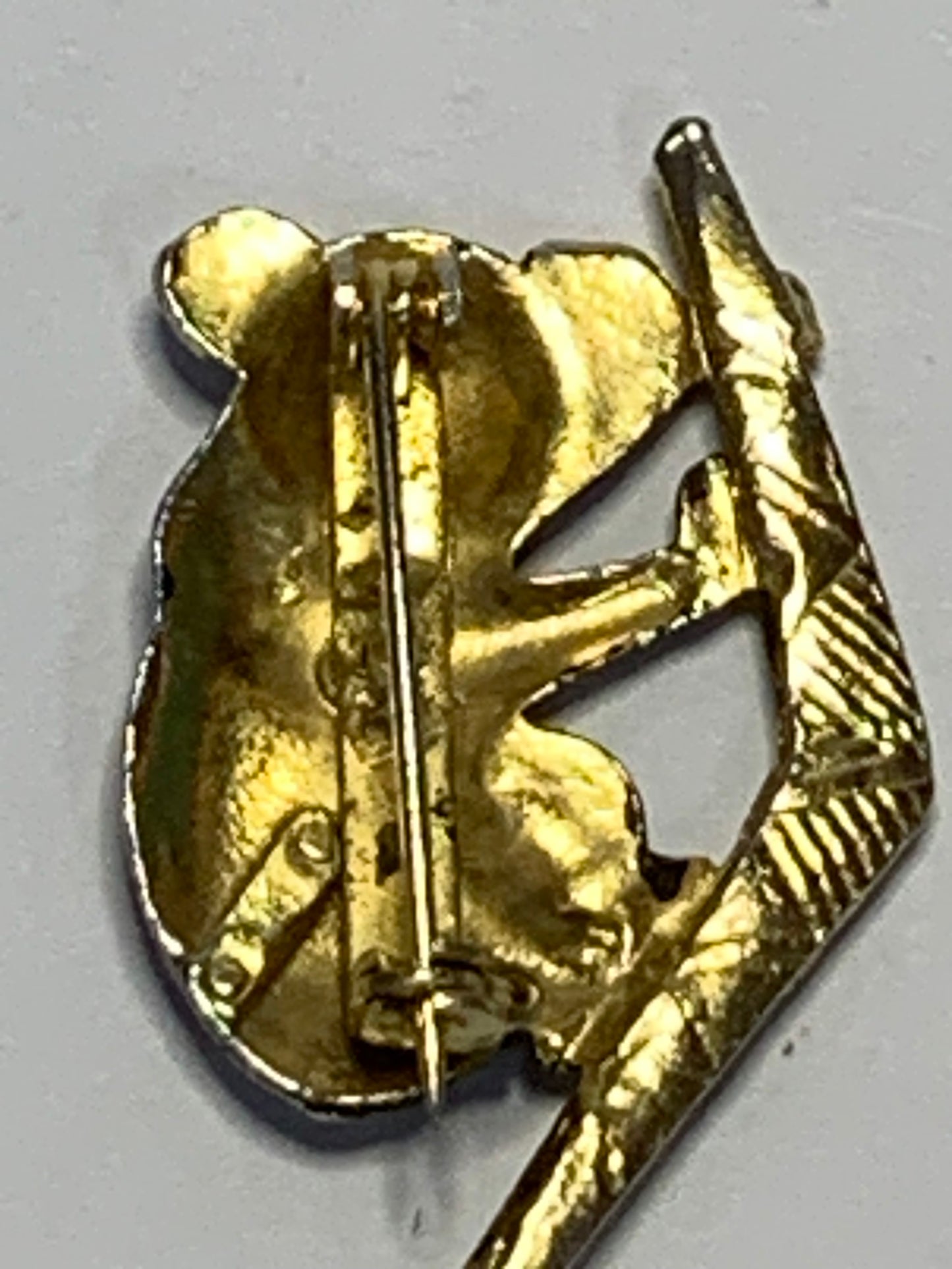 Vintage koala brooch featuring an iconic Australian design with a koala clinging to a boomerang