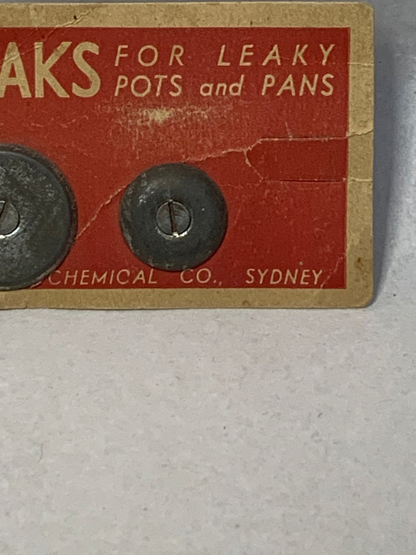 Vintage “Stopleaks” pot and pan mending kit on original store display card