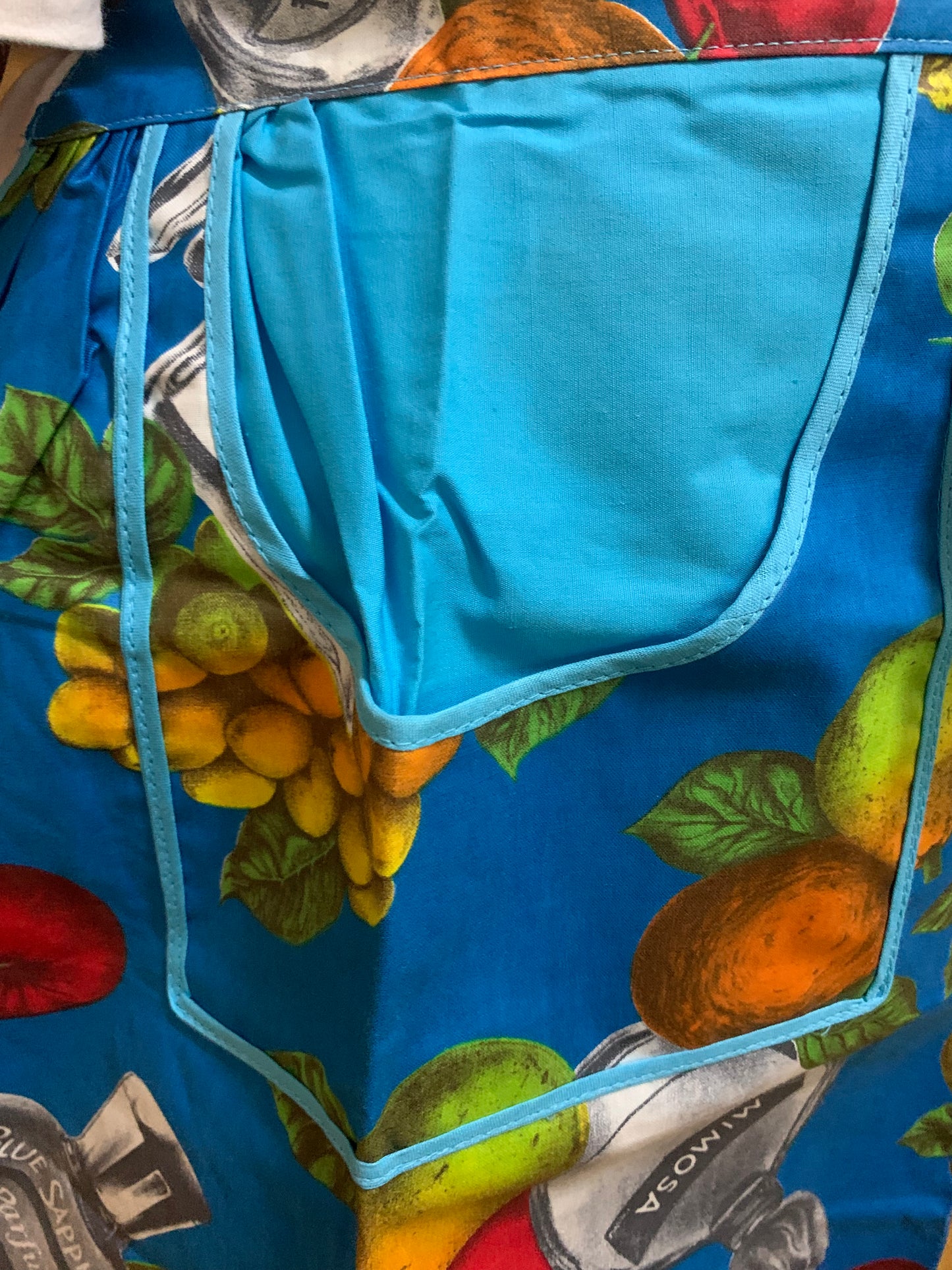 Vintage 1970s Taniwha Half Apron - Tropical Fruit & Perfume Bottle Novelty Print
