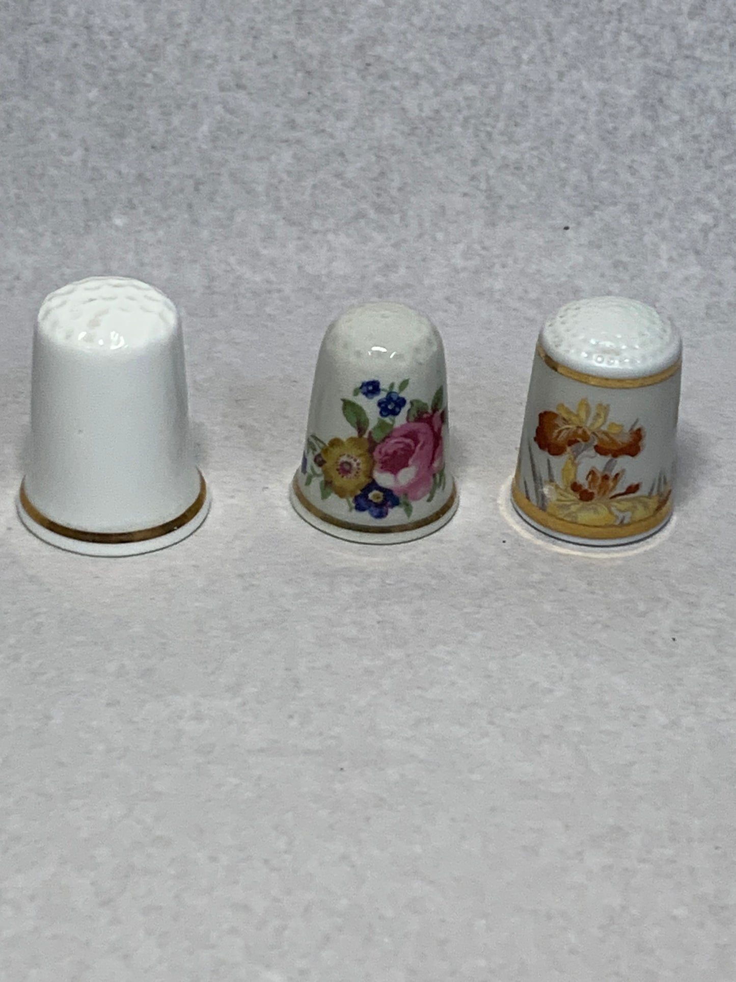 Set of three vintage bone china thimbles