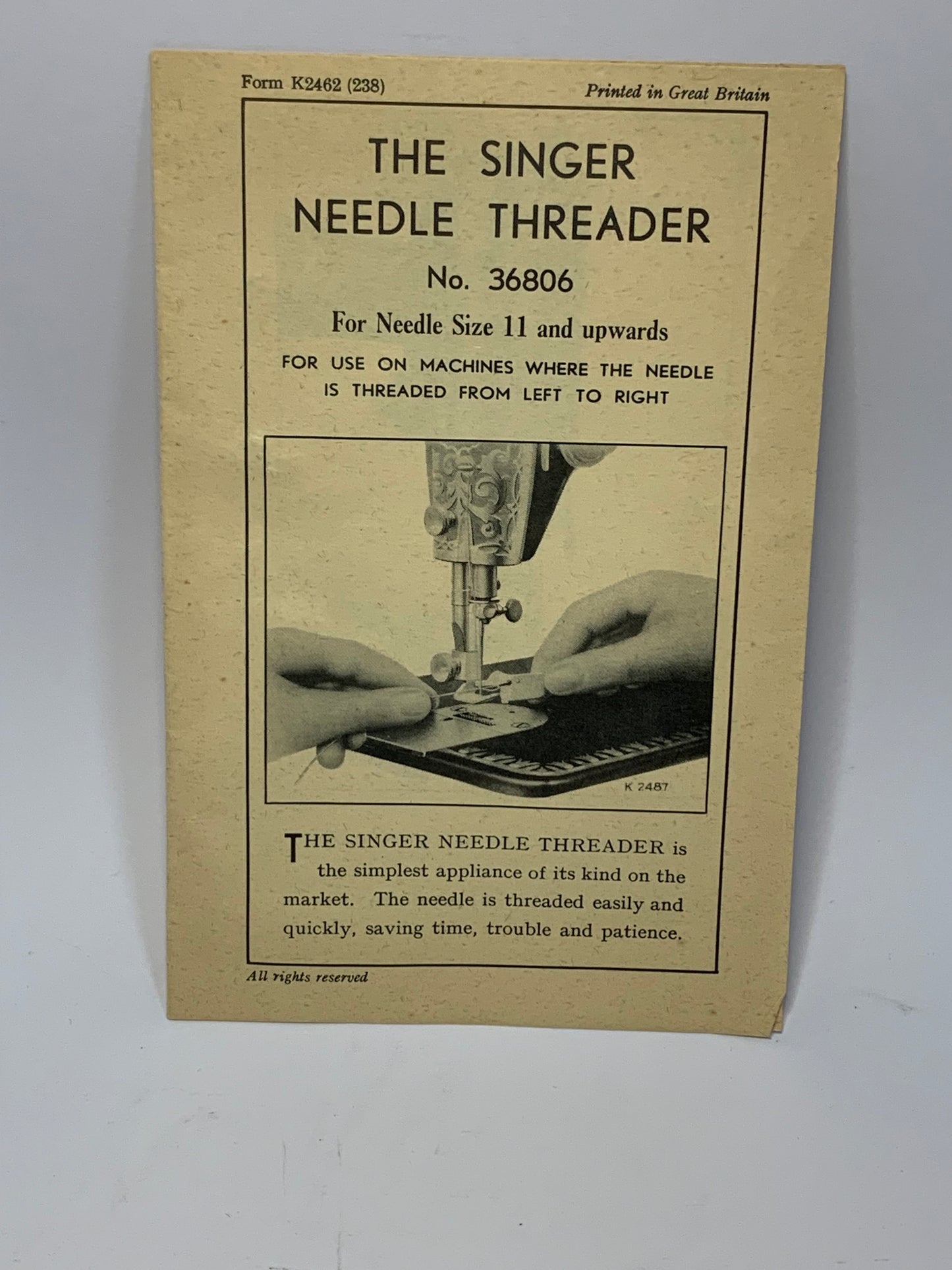 Vintage Singer Needle Threader No. 36806 with original packaging and documentation
