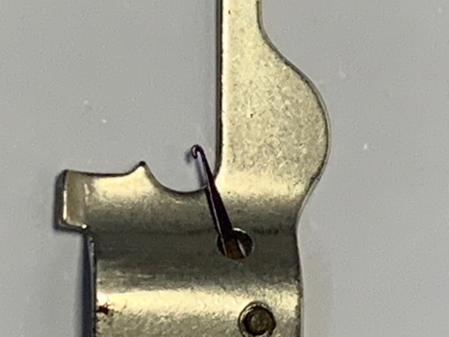 Vintage Singer Needle Threader No. 36806 with original packaging and documentation