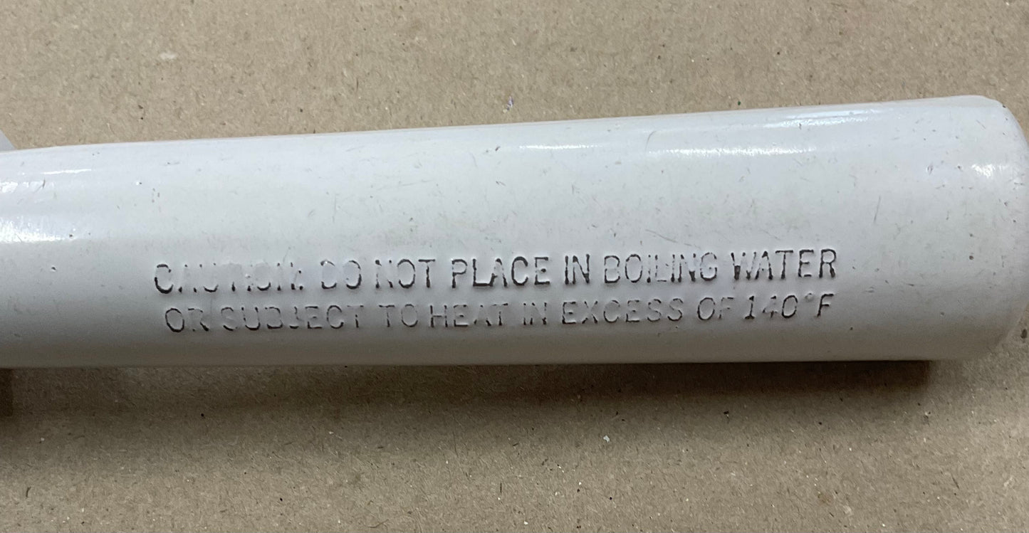 Vintage white enamel ice cream scoop with a tubular handle