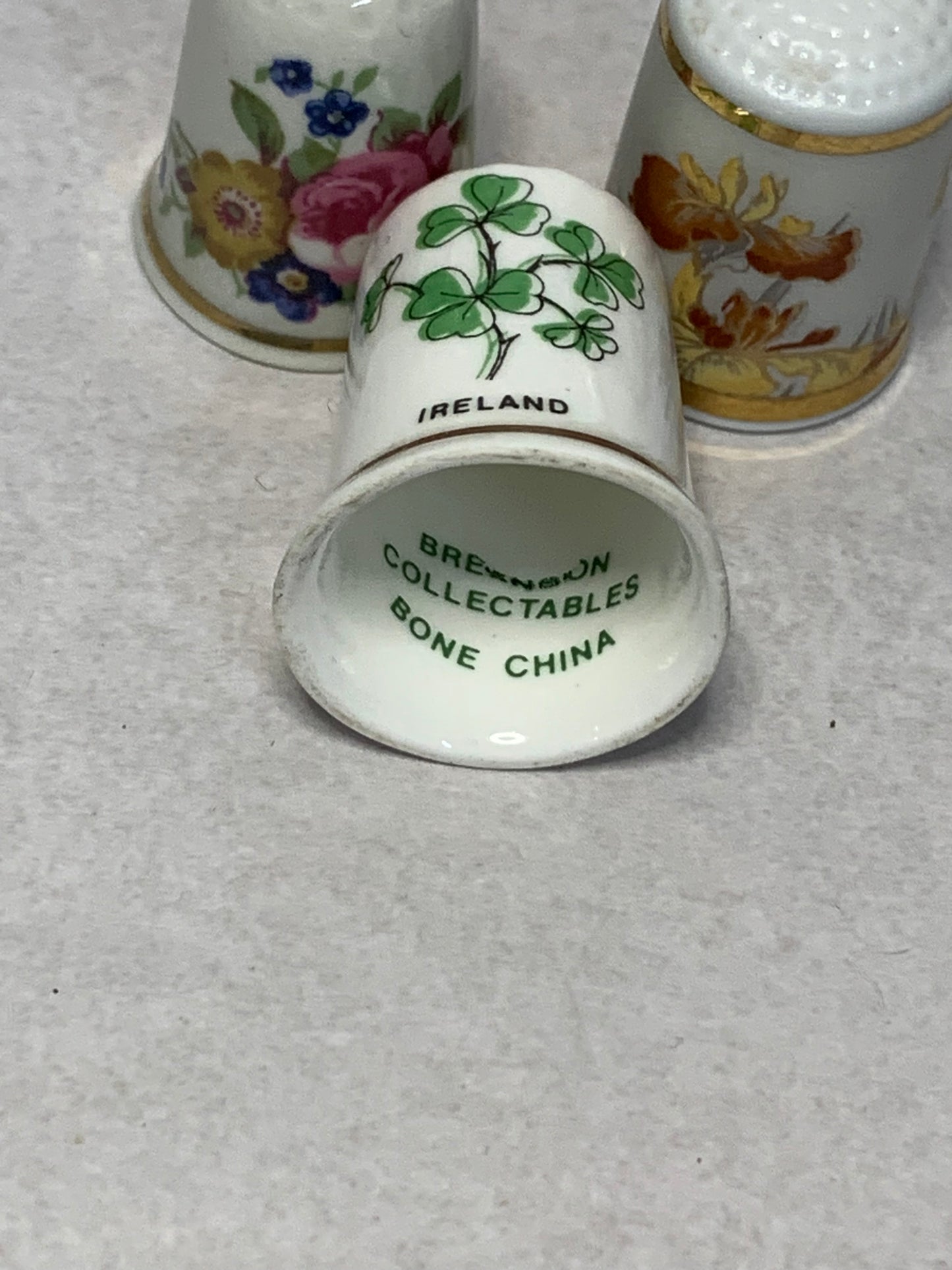 Set of three vintage bone china thimbles
