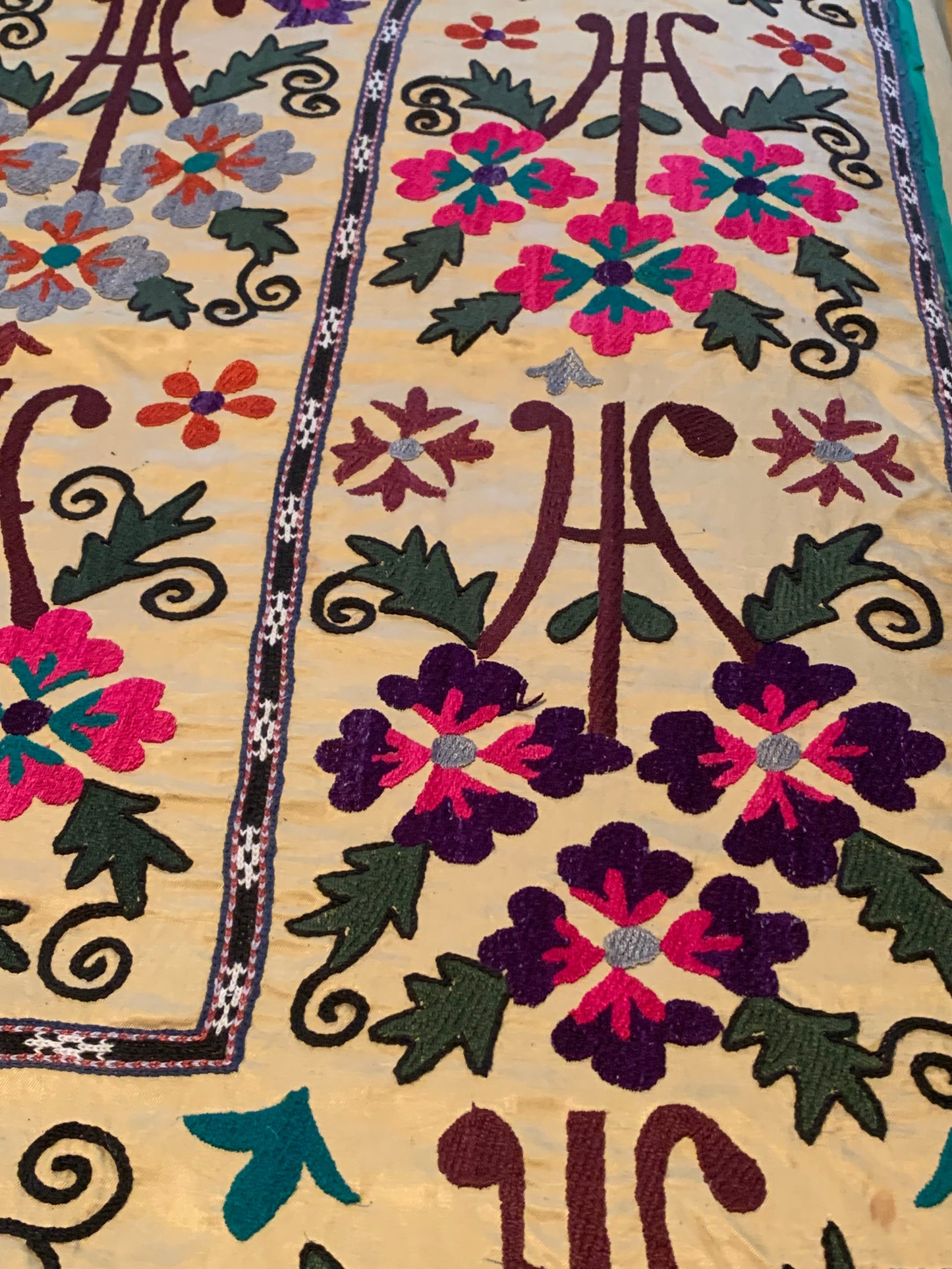 Vintage Suzani Textile featuring hand embroidery