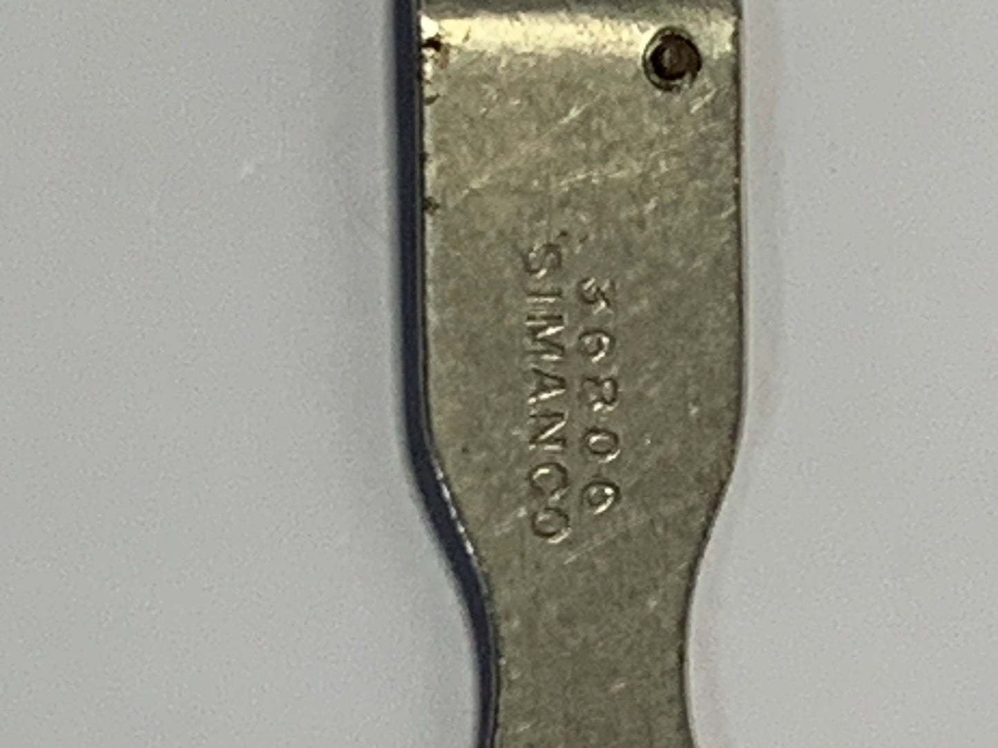 Vintage Singer Needle Threader No. 36806 with original packaging and documentation