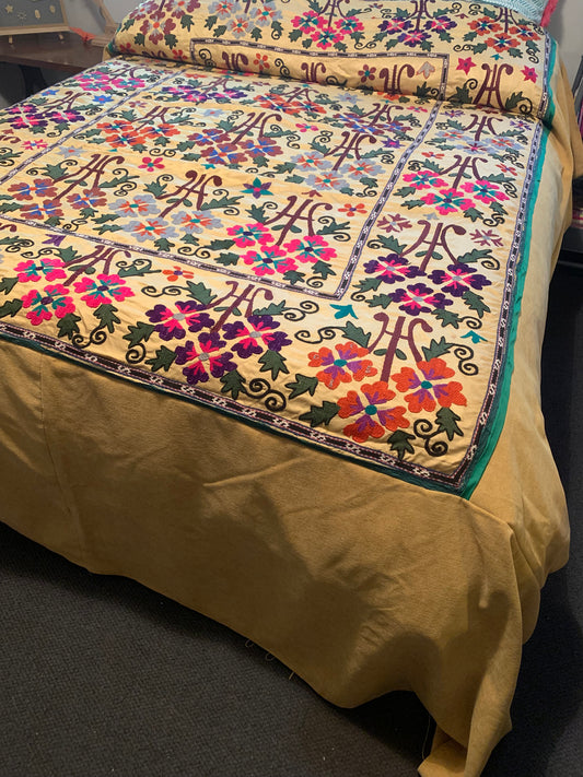 Vintage Suzani Textile featuring hand embroidery