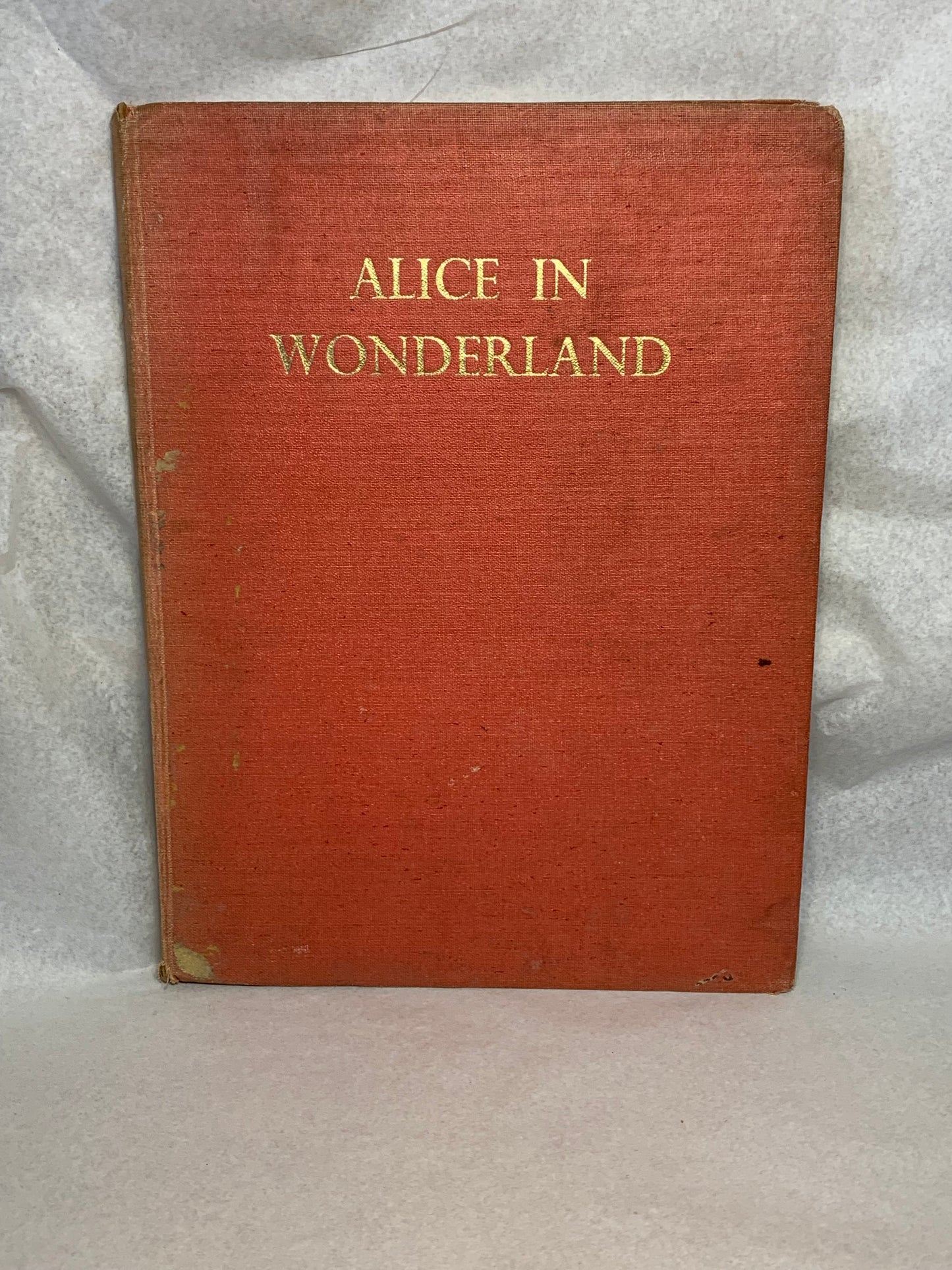 1944 first edition (thus) of Alice’s Adventures in Wonderland by Lewis Carroll, illustrated in colour by A. Rado, published by Newman Wolsey Limited, London and Leicester
