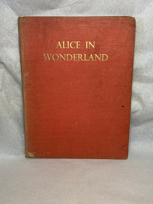 1944 first edition (thus) of Alice’s Adventures in Wonderland by Lewis Carroll, illustrated in colour by A. Rado, published by Newman Wolsey Limited, London and Leicester