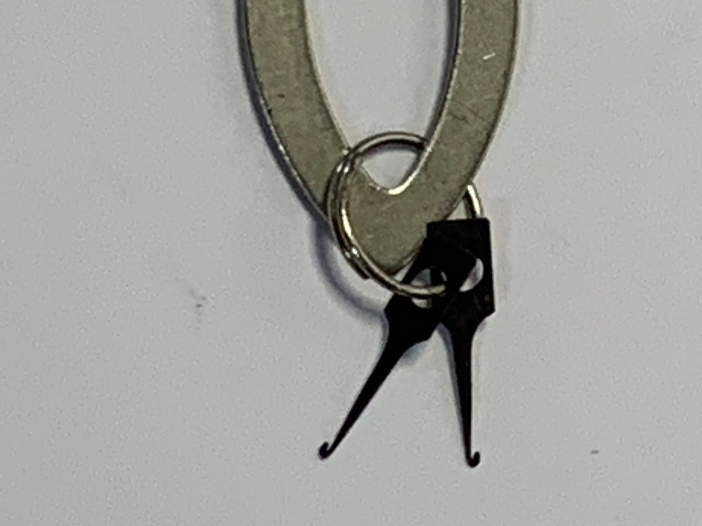 Vintage Singer Needle Threader No. 36806 with original packaging and documentation