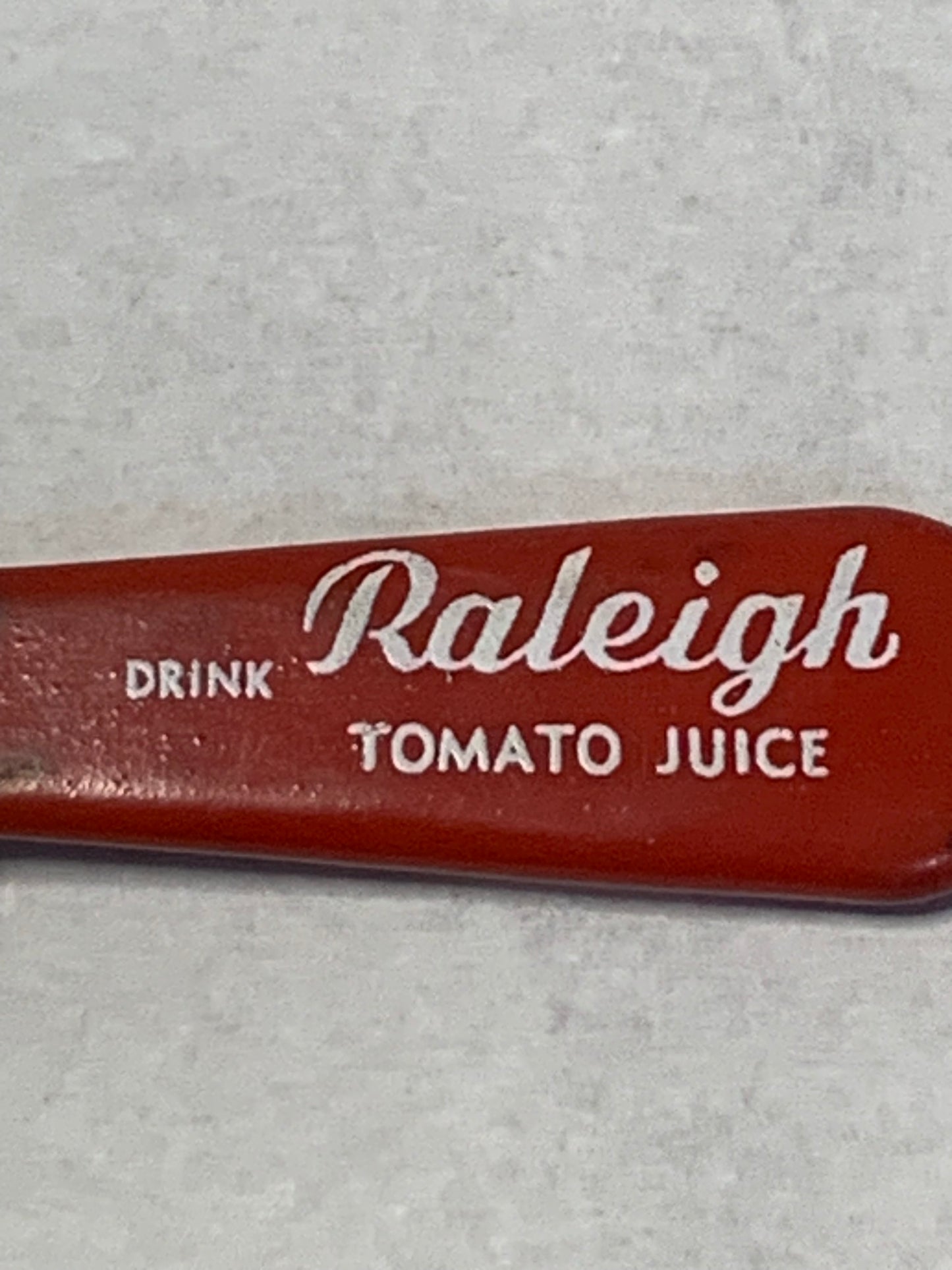 Vintage “Drink Raleigh Tomato Juice” advertising bottle/can opener
