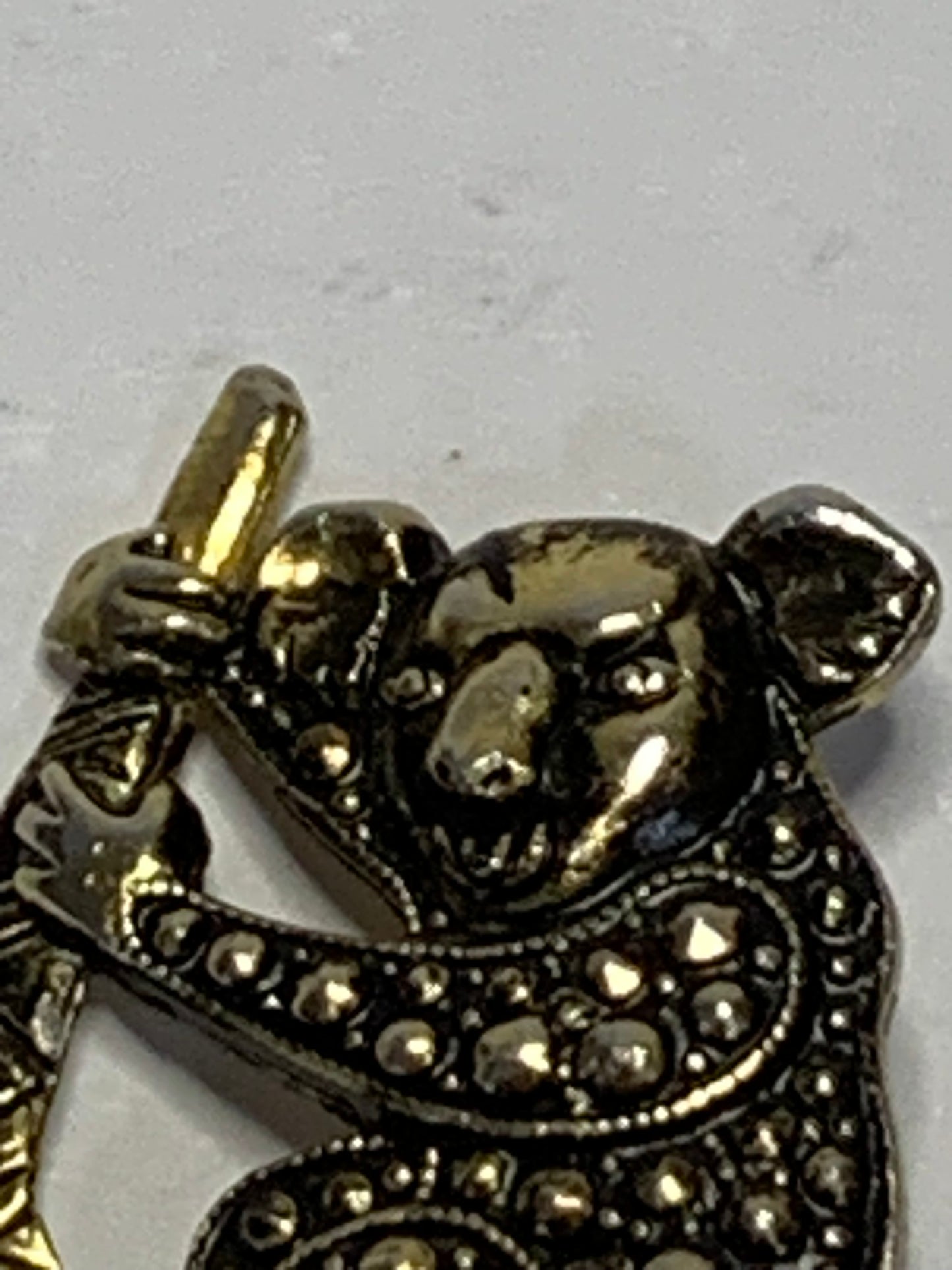 Vintage koala brooch featuring an iconic Australian design with a koala clinging to a boomerang