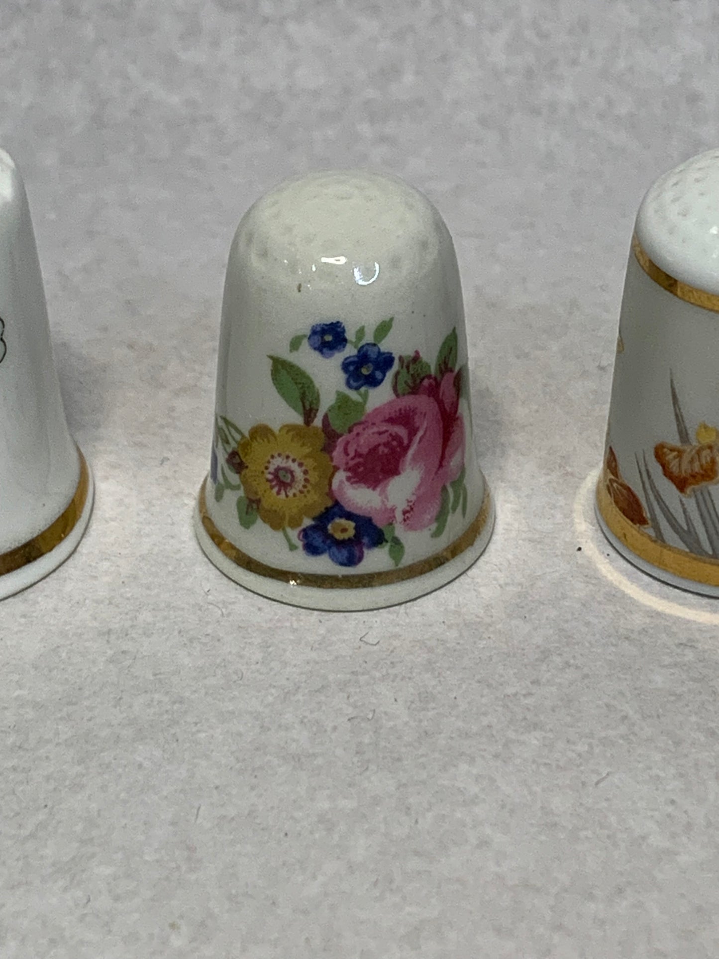 Set of three vintage bone china thimbles