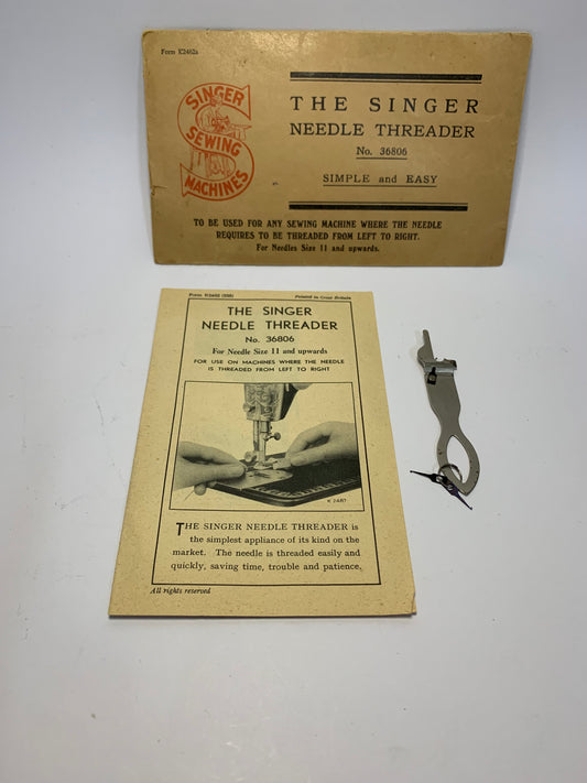 Vintage Singer Needle Threader No. 36806 with original packaging and documentation
