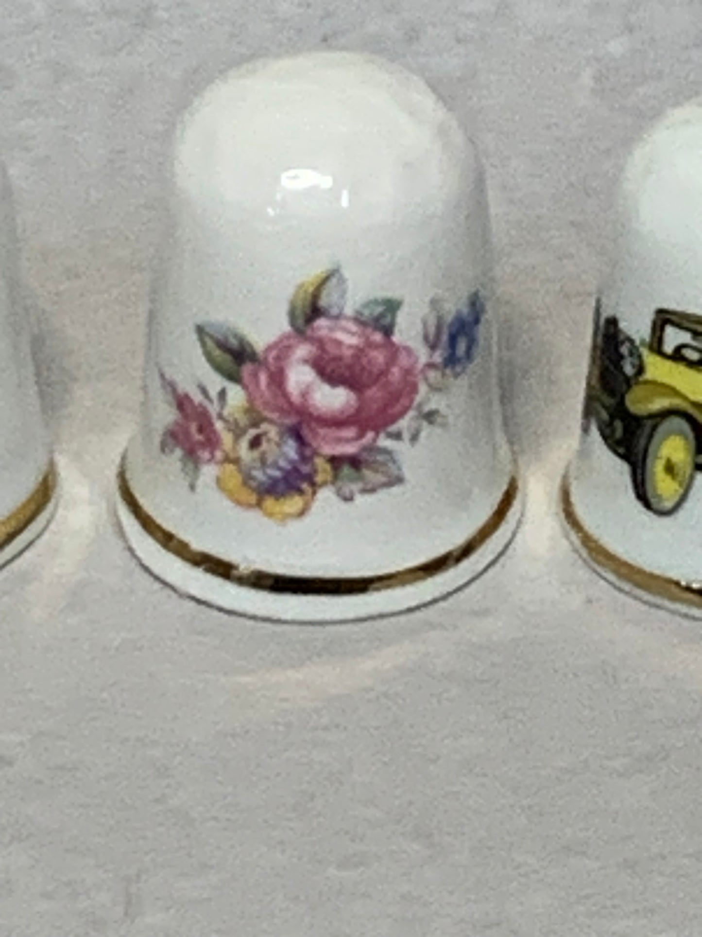 Set of 5 vintage Croft China (England) fine bone china thimbles, each with a gilt gold rim band