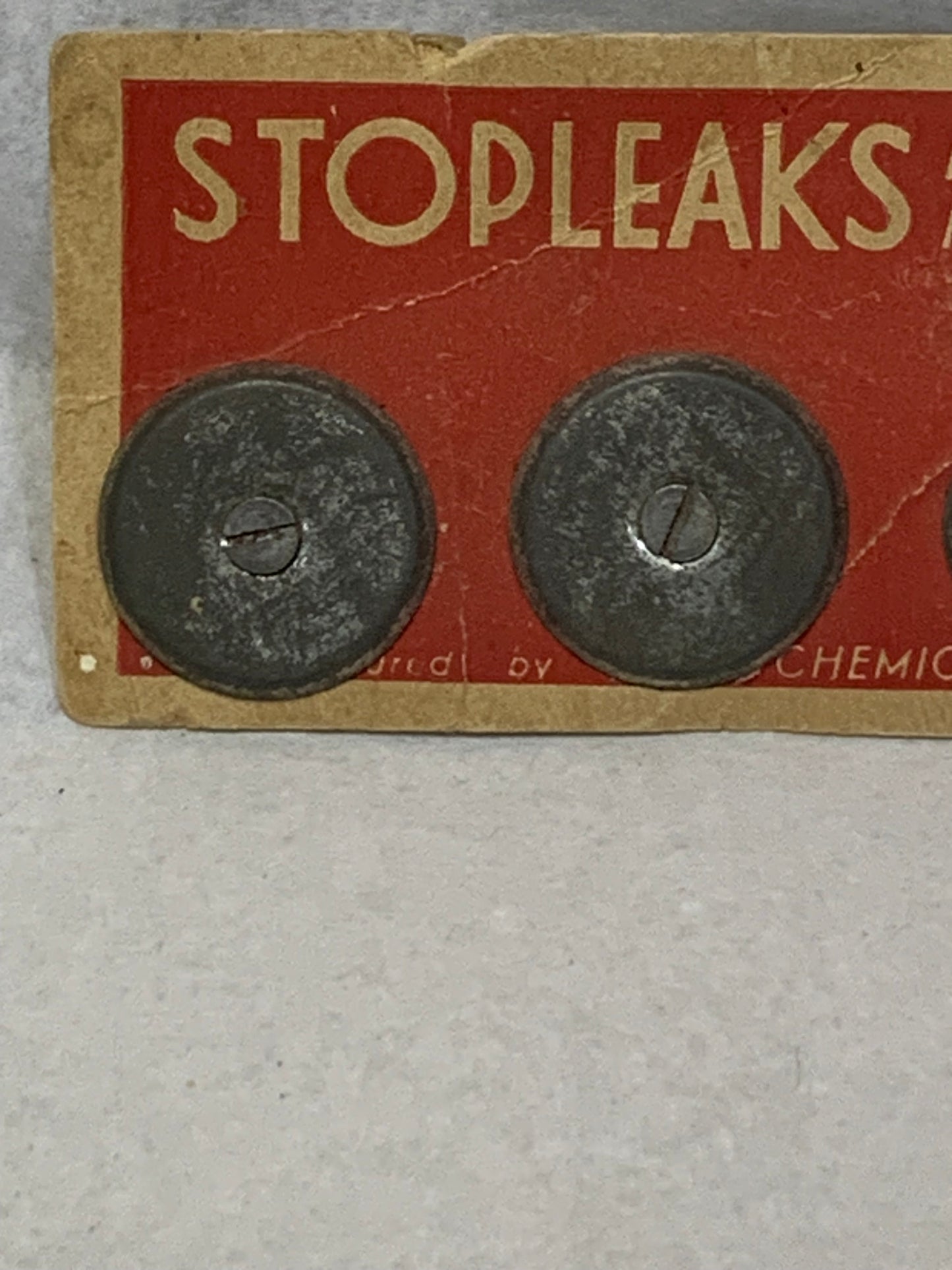 Vintage “Stopleaks” pot and pan mending kit on original store display card