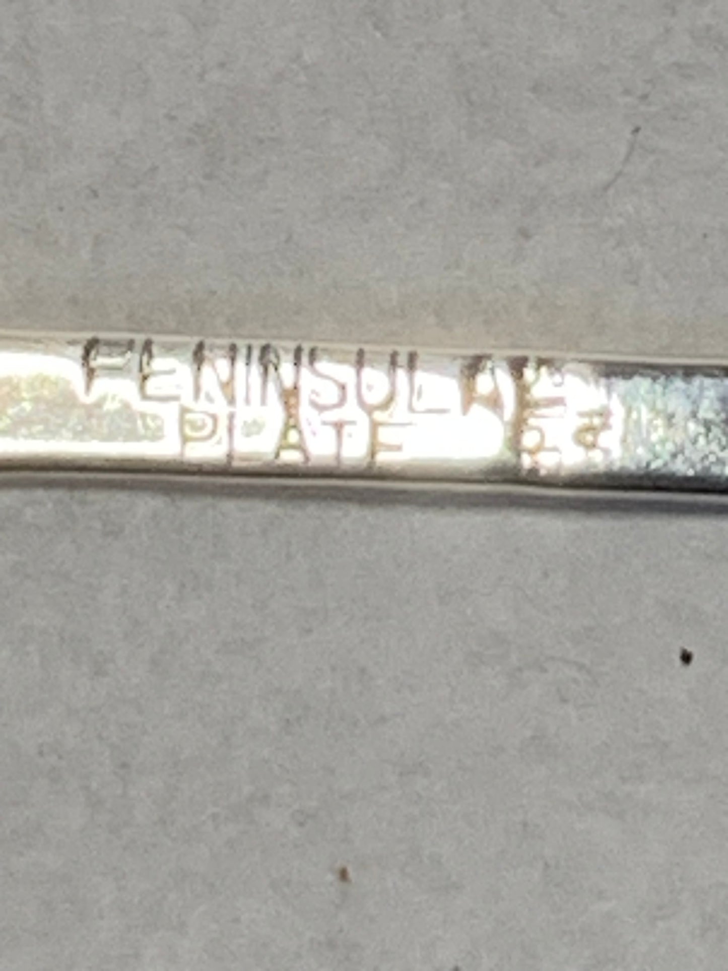 Set of six vintage silver-plated souvenir teaspoons featuring the enameled coats of arms of Australia’s state capital cities: Adelaide, Brisbane, Sydney, Perth, Hobart, and Melbourne