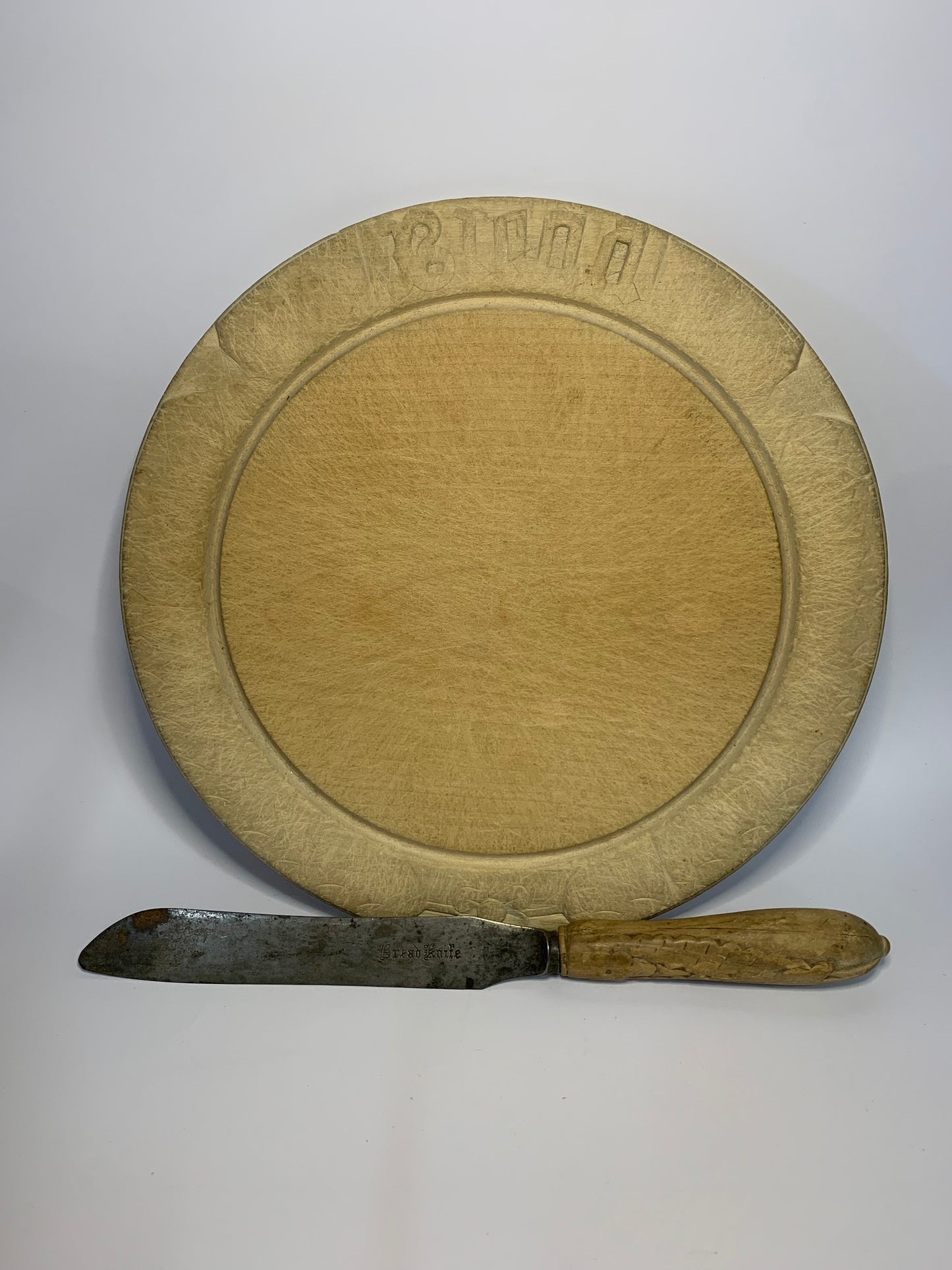 Vintage round wooden Bread Board with matching Bread Knife