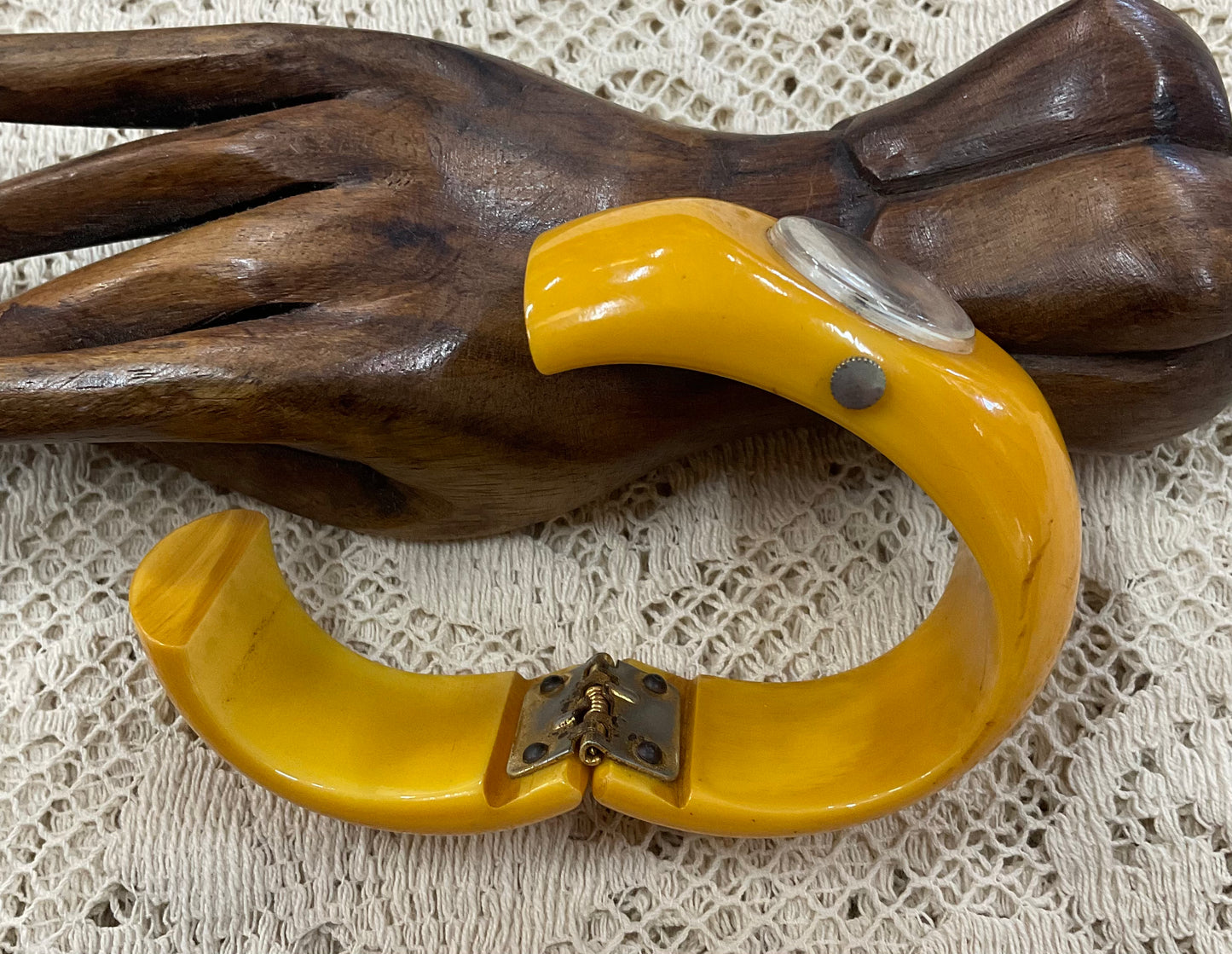 Vintage Royal Dynasty Bakelite butterscotch yellow cuff bangle watch featuring a bold mid-century modern design
